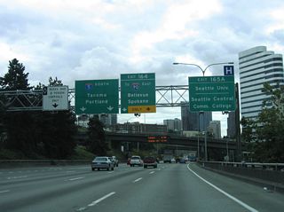 Interstate 5 south carries two general purpose and one HOV-2 lane through the Seattle central business district. The right two lanes facilitate access to Exit 165 A for James Street, Exit 165 B for Union Street, and Exit 164 for I-90. James Street east to Broadway serves interests to Seattle University and Seattle Central Community College.