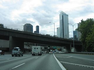 Two Union Square anchors the northern extent of the Seattle skyline in this scene along Interstate 5 south at Olive Way.