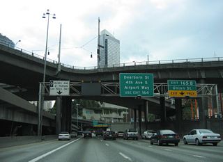 Interstate 5 south travels under the Washington State Convention Center at Exit 165 B to Union Street. Union Street flows west to Waterfront Park.