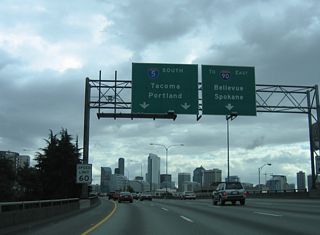 Exit 164 constitutes a 1.65 mile long collector distributor roadway that eventually leads to Interstate 90 east to Mercer Island and Bellevue. The local roadway also provides access to the various ramps south of Downtown Seattle.