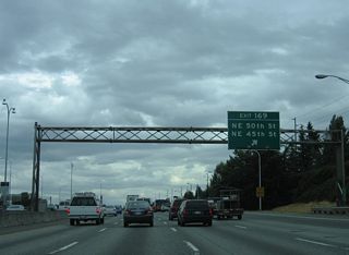 NE 45th Street becomes a part of SR 513 at University Village. SR 513 is a 3.35 mile spur northeast from SR 520 to NE 65th Street at Warren G. Magnuson Park.