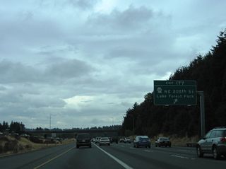 Exit 177 leaves Interstate 5 south for SR 104 ahead of the half diamond interchange with 236th Street SW. SR 104 follows Ballinger Way southeast to Lake Forest Park and SR 522 (Bothell Way). NE 205th Street carries the state route west to Edmonds Way in Edmonds.