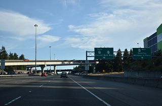 The c/d roadway for Exit 189 splits into ramps for Boeing Freeway west and SR 99 (Broadway) near Everitt Mall. Broadway becomes Everett Mall Way southwest to Evergreen Way.