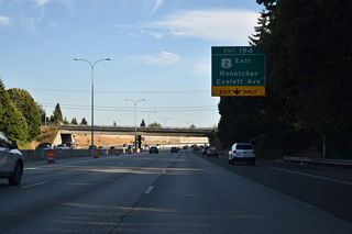A half diamond interchange (Exit 195) adds an auxiliary lane from Grand Avenue south to Exit 194 for U.S. 2 east and Everett Avenue west to SR 529.