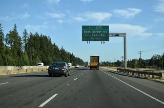 Quil Cela Way joins Interstate 5 south as a parallel frontage road to the diamond interchange with 88th Street NE at Exit 200. 88th Street NE leads east to State Avenue (former U.S. 99) and 67th Avenue NE in Marysville.
