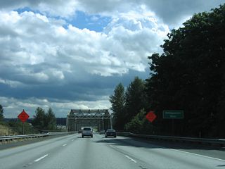 Interstate 5 crosses the Stillaguamish River one half mile north of Exit 208.