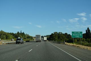 Starbird Road meets Interstate 5 at a rural diamond interchange in southern Skagit County. Starbird becomes Milltown Road west to Pioneer Highway (former SR 530) at Milltown.