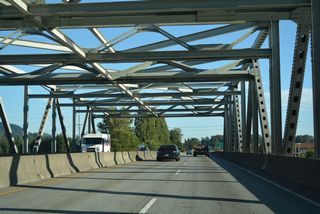 The Skagit River bridge partially collapsed on May 23, 2013 when a semi-truck hit several crossbeams of the truss, causing a support failure of the north span of the crossing. Restoring the bridge to service on June 19, 2013, temporary steel prefabricated modular spans filled the 160 foot gap caused by the collapse. A permanent span was subsequently installed on September 15, 2013 (Long, 2013).