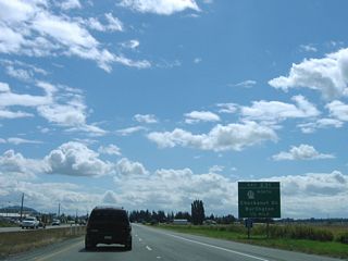 SR 11 angles southeast from Edison Station and Allen to end at Exit 231. SR 11 was once a part of U.S. 99 Alternate leading northwest to Bellingham.