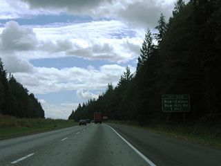 Advancing south, I-5 connects with Bow Hill Road at a diamond interchange (Exit 236) in one mile. Bow Hill Road links the freeway with the rural communities of Bow, Edison Station, and Edison to the west.