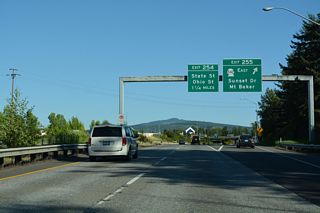 Exit 255 leaves Interstate 5 south for SR 542 east and Sunset Drive west to Illinois Street, Broadway and Bellingham Bay. SR 542 overall travels 57.29 miles between Bellingham and the Mount Baker Ski Area.