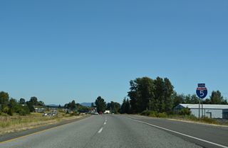 Continuing south from Exit 262, Interstate 5 gains frontage roads (La Bounty Drive north / Barrett Road south) to the Smith Road overpass.