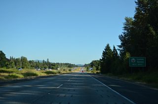 Slater Road travels west to Haxton Way south for the Lummi Indian Reservation and ferry to Lummi Island.
