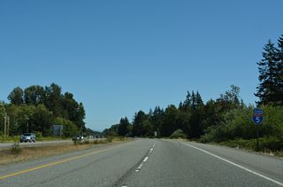 A second wye interchange links Peace Portal Drive (historic U.S. 99) near the separation with SR 548 (Bell Road) in south Blaine to Interstate 5 south ahead of Dakota Creek and the third reassurance shield.