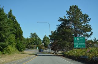 Marine Drive east from Blaine Harbor feeds into the western roundabout at the dumbbell interchange (Exit 276) with SR 548 (Peace Portal Drive). SR 548 comprises a 13.85 mile long loop south through Blaine to Birch Bay and east back to Interstate 5 at Exit 266.