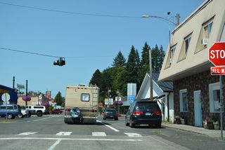 SR 411 is unmarked along Huntington Avenue north where the route combines with Business Loop I-5. SR 411 south follows A Street west across the Cowlitz River to Westside Highway.