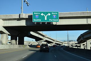 SR 16 concludes at a directional T interchange with Interstate 5.