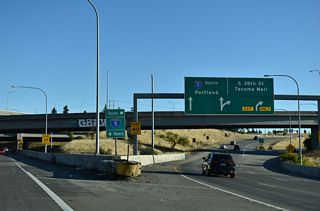 Motorists taking the southbound ramp to I-5 join a collector distributor roadway ahead of Exit 133 for S 38th Street.