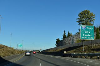 I-5 north next meets Interstate 705 south of the Tacoma city center.