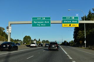 SR 16 advances 0.75 miles east from Exit 1 B to Exit 1 A for Sprague Avenue north.
