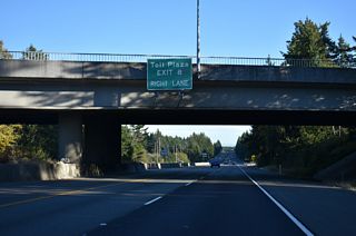 The toll plaza for cash transactions for the Tacoma Narrows Bridge is Exit 8. Exit 8 from SR 16 westbound serves 24th Street NW.