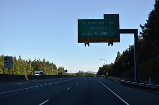 Exit 9 provides the last departure point before tolls are collected for the Tacoma Narrows Bridge. The RIRO (right in right out) ramps connect the freeway with 36th Street SW west to Point Fosdick Drive NW north of Tacoma Narrows Airport (TIW).