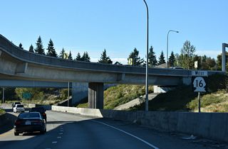 SR 16 confirming marker posted ahead of the flyover for the ramp linking I-5 northbound with SR 16 west at Exit 1 A.