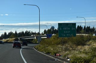 Turning north, SR 16 enters a six-ramp parclo interchange (Exits 2 A/B) with S 19th Street at Orchard Street.