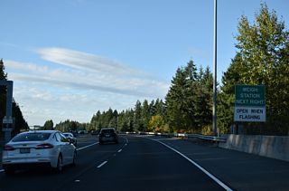 The HOV restriction for the left lane concludes along SR 16 westbound just beyond the weigh station.