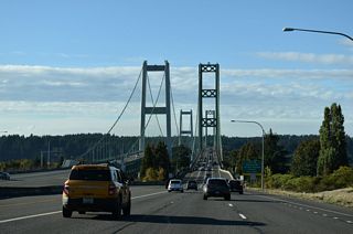 SR 16 crosses The Narrows between Tacoma and Gig Harbor. Westbound SR 16 spans the suspension bridge built in 1950. Eastbound traffic crosses The Narrows over the companion suspension bridge opened in July 2007.