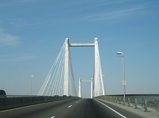 The Cable Bridge carries four overall lanes and sidewalks along both directions of SR 397. The 80-foot wide bridge utilizes a 2,503-foot continuous girder.
