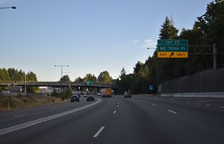 A folded diamond interchange (Exit 17) follows between Interstate 405 and NE 70th Place in Kirkland. NE 70th Place/ NE 70th Street lead east to Snyders Corner at the Redmond city line. Westward, NE 72nd Place / NE 68th Street continue the street to Feriton and Houghton.