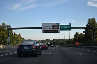 A six-ramp parclo interchange at Exit 20 joins I-405 south with NE 124th Street in the Totem Lake Mall area of Kirkland.