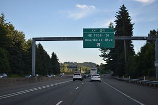 Meeting the I-405 next is NE 195th Street east of Ross Road and Beardslee Boulevard. Beardslee Boulevard angles southwest from Exit 24 to the Bothell city center.