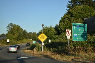 NE 124th Street enters the six-ramp parclo interchange (Exit 20) with Interstate 405 east from 116th Avenue NE / 120th Avenue NE at Totem Lake in Kirkland.