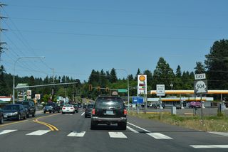 Eastbound SR 504 (Spirit Lake Memorial Highway) begins at the diamond interchange joining Interstate 5 with Business Loop I-5/SR 411 (Huntington Avenue) south in the city of Castle Rock.