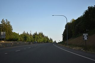 Southbound reassurance shield posted for SR 525 after the entrance ramps from SR 99 by the 148th Street SW overpass.