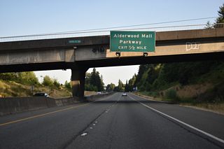 SR 525 advances a half mile south from the 164th Street SW (old SR 525) overpass to Alderwood Mall Parkway. Alderwood Mall Parkway leads south from old SR 525 to Alderwood Mall, SR 524 (196th Street SW) and Interstate 5 at Exit 181 B.