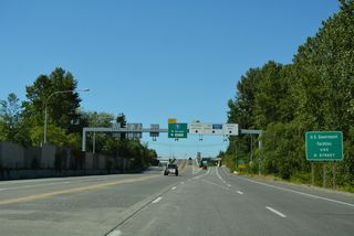 Left side ramps connect SR 543 with D Street at a grade separated intersection.