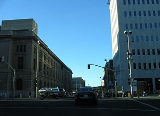 Riverside Avenue crosses Lincoln Street at the next intersection as a four lane boulevard east to U.S. 2 & 395 (Division Street north) and west to High Bridge Park and Government Way.