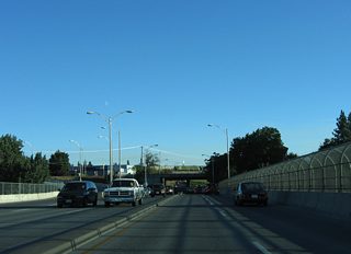 A viaduct extends southward from the Maple Street Bridge through Peaceful Valley to ramps with 1st Avenue at Sprague Avenue.
