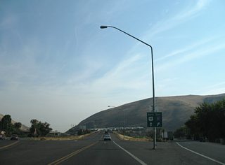 Main Street leaves the city of Union Gap at a wye interchange with a connector ramp to I-82/U.S. 12 east. Main Street otherwise spans a Washington Central Railroad line and merges with U.S. 97 en route to Parker.