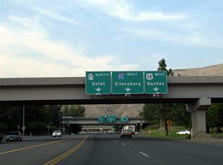 A loop ramp joins U.S. 12 west as the route leaves Yakima for Naches Valley and the town of Naches. SR 823 appears as the state route begins ahead and continues the original alignment of U.S. 97 into Selah.