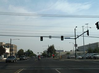 Lincoln Way flows westward from Fair Avenue to N 6th Avenue. The one way street was a part of Business Loop I-82 between N 1st Street and N B Street until 1999.
