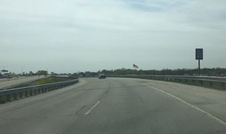 A Interstate 41 sign appears next. There was once an end Business U.S. 41 sign at the same location.