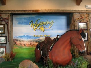 In 2010, the Wyoming Tourism slogan was "Forever West." A small display including a mountable horse was available inside the Northeast Wyoming Information Center.
