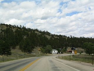 The town of Carlile comes into view, with its handful of buildings and limited services.