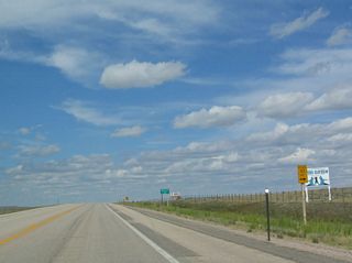 Eastbound U.S. 14 reaches eastbound Wyoming 113. Wyoming 113 ends at Pine Haven and does not return to Interstate 90.