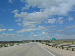 U.S. 14 crosses the Belle Fourche River. This river flows from Keyhole Reservoir to the northeast, passing by Devils Tower, Hulett, and even Colony before turning southeast again to pass through the city of Belle Fourche, South Dakota.