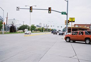 After the U.S. 310/Wyoming 789 intersection, westbound U.S. 14 Alternate enters Powell. Near downtown, U.S. 14 Alternate approaches the junction with Wyoming 295 north to Elk Basin.